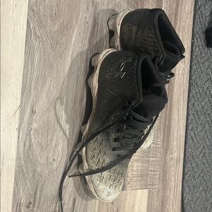 Under Armour Black and White Athletic Cleats